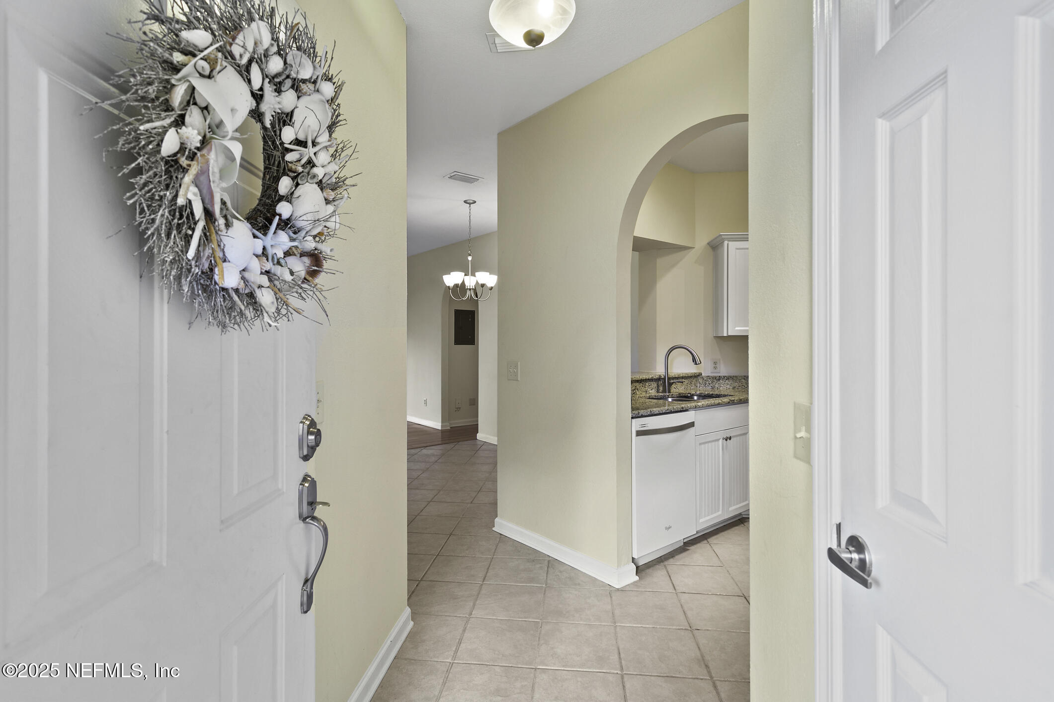 2521 Vista Cove Road St. Augustine, FL 32084 - Photo 2 of 64 a view of a kitchen from the hallway