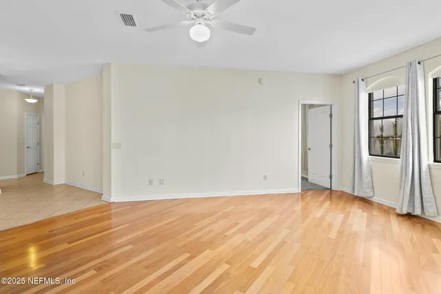 an empty room with a bathroom