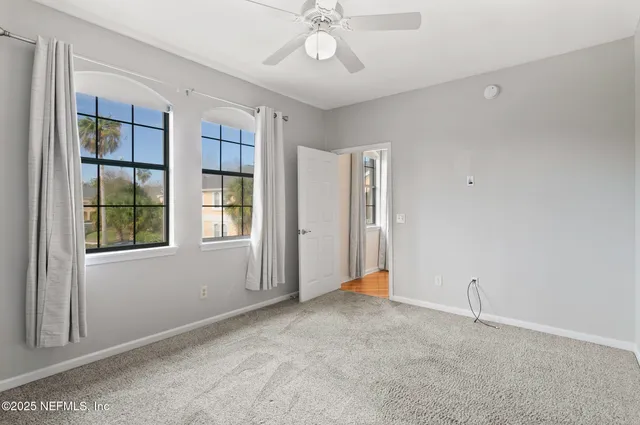 a bathroom with a sink a mirror and shower