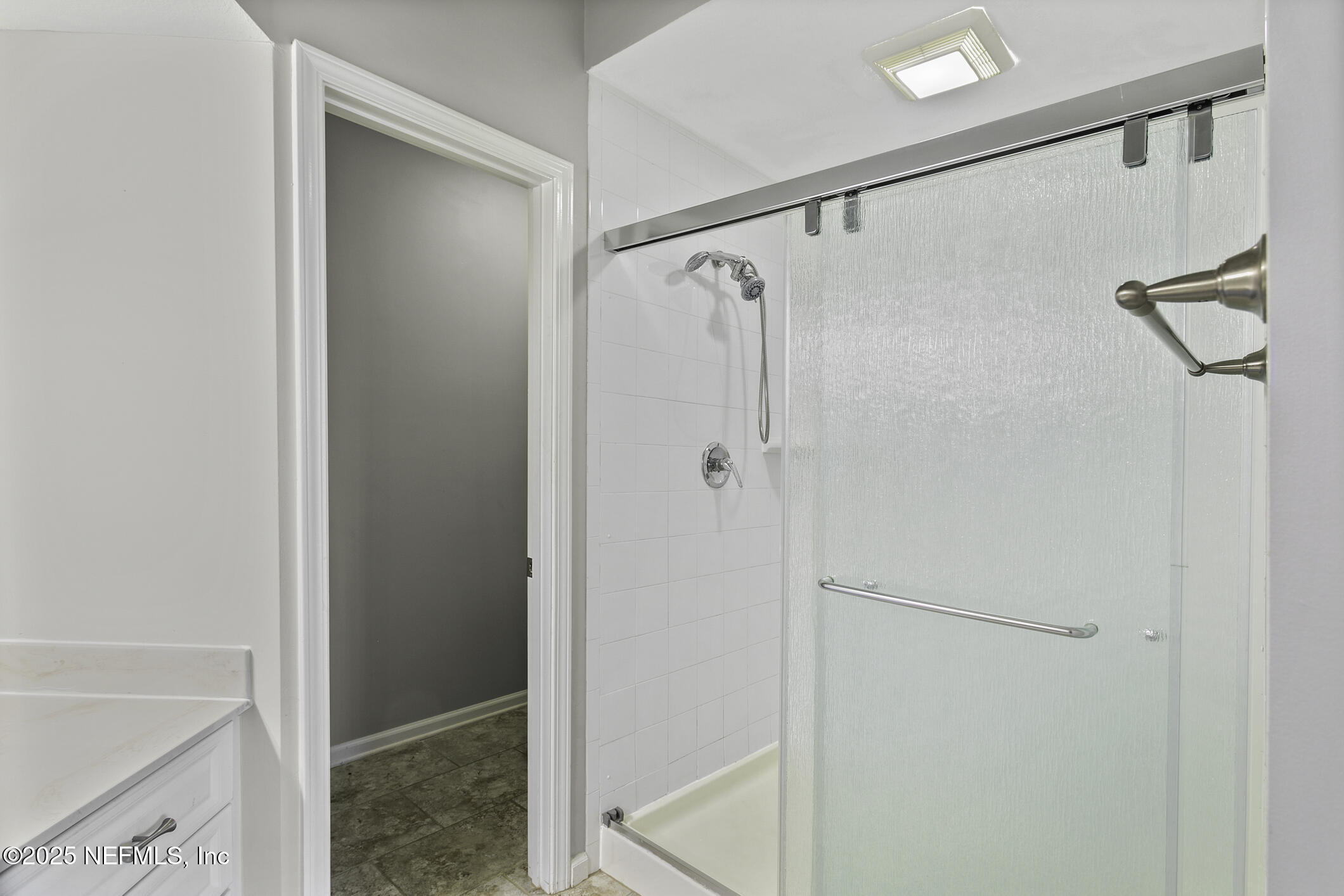 2521 Vista Cove Road St. Augustine, FL 32084 - Photo 28 of 64 a bathroom with a shower and a glass door