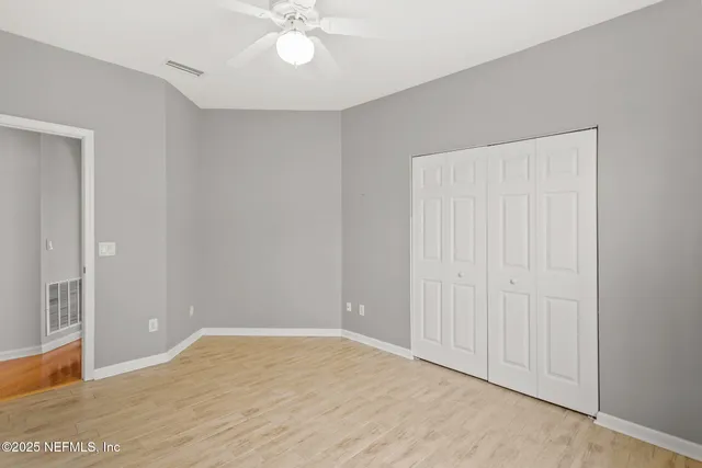 a view of small space with racks on the wall