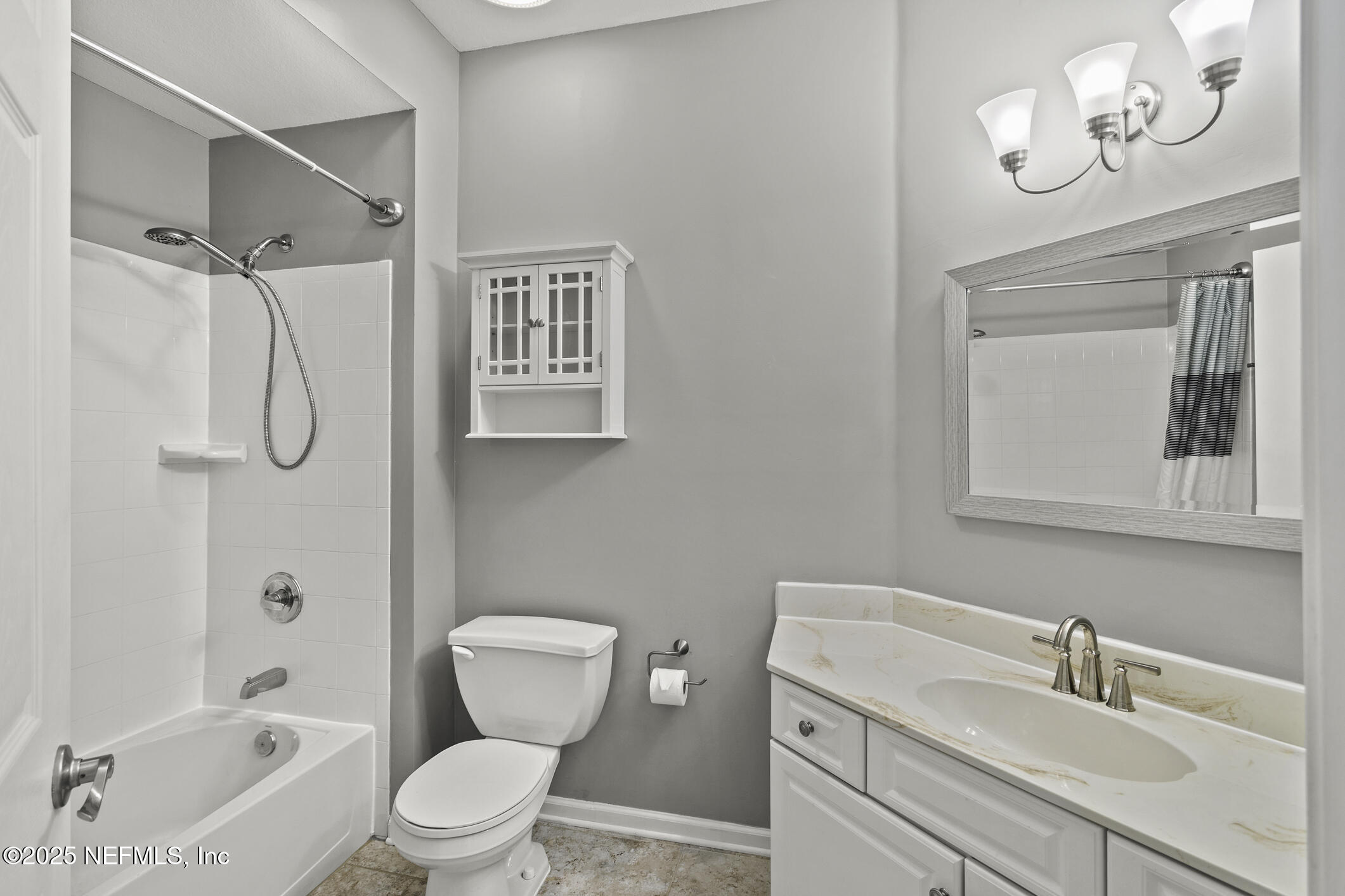 2521 Vista Cove Road St. Augustine, FL 32084 - Photo 33 of 64 a bathroom with a sink a toilet and a bathtub