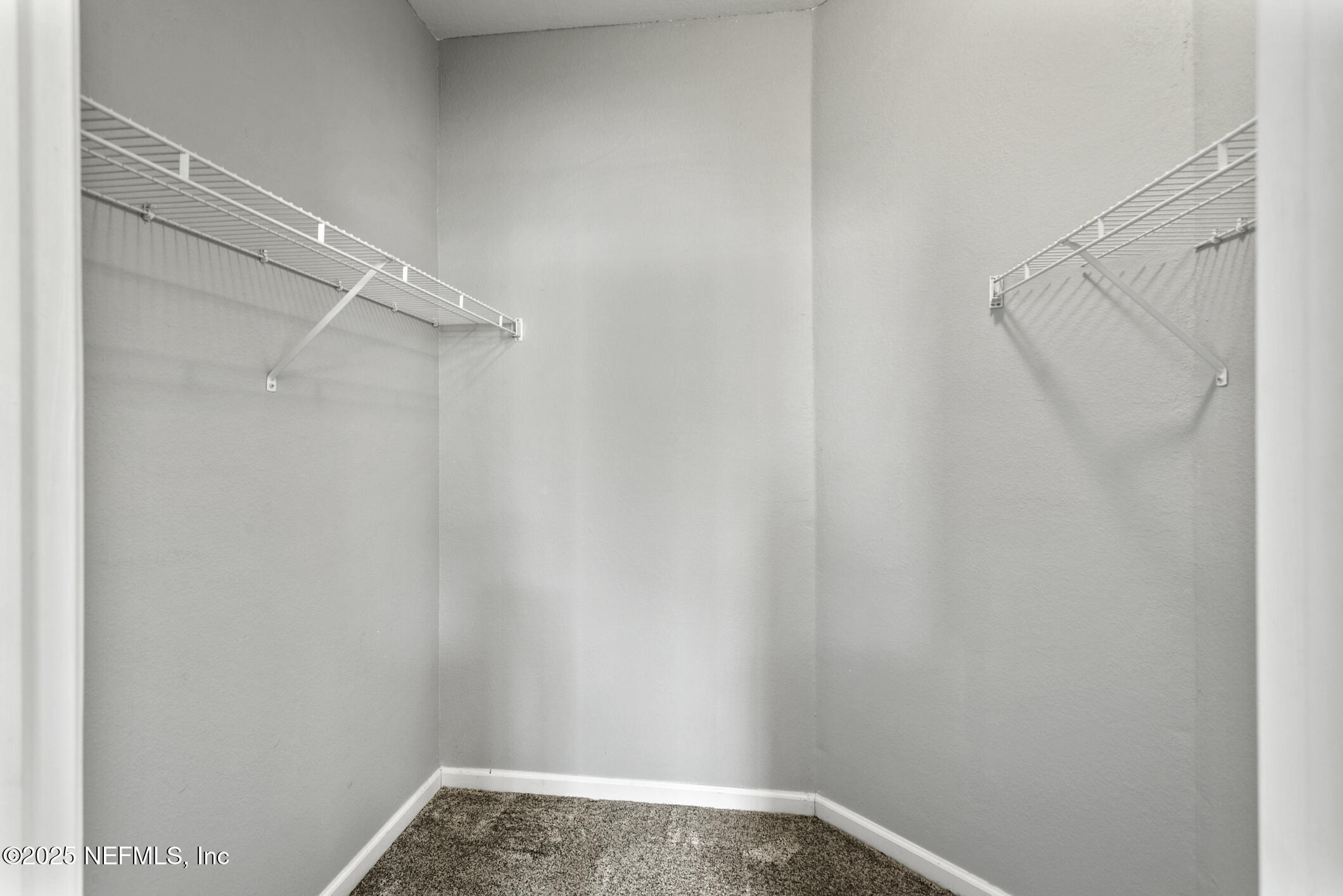 2521 Vista Cove Road St. Augustine, FL 32084 - Photo 34 of 64 a view of small space with racks on the wall