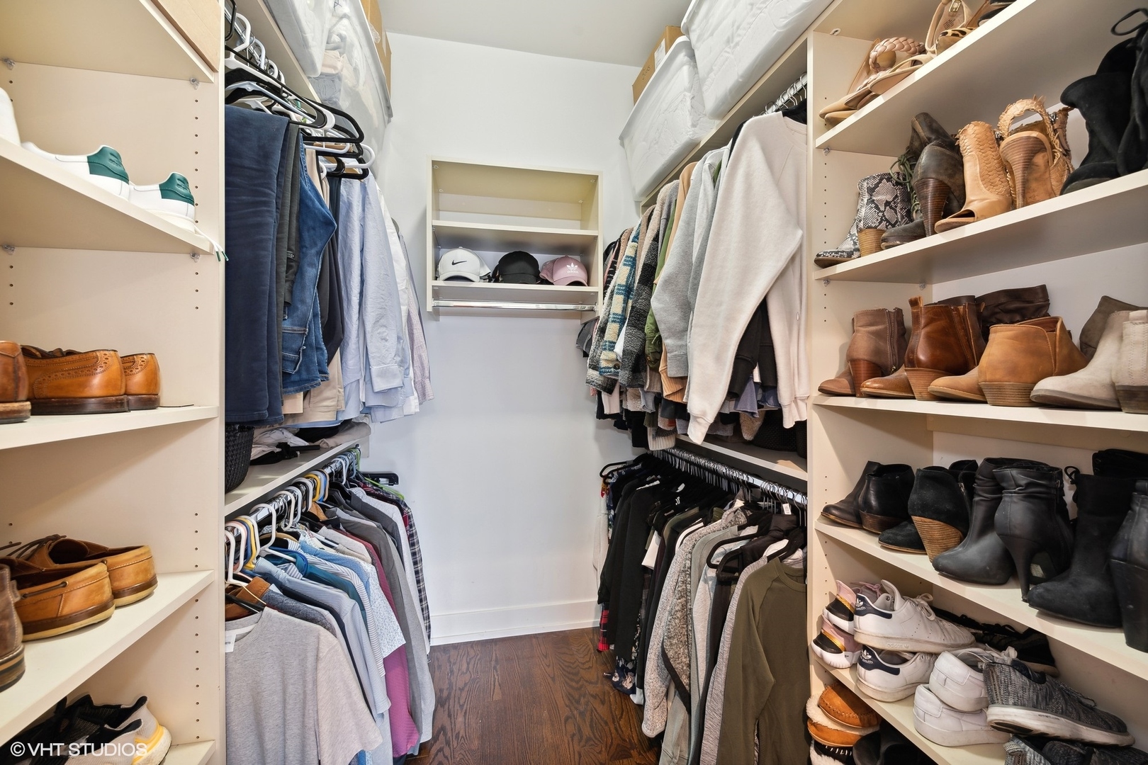 3003 North California Avenue, Unit 2N Chicago, IL 60618 - Photo 11 of 17 a view of walk in closet with clothes and shoes