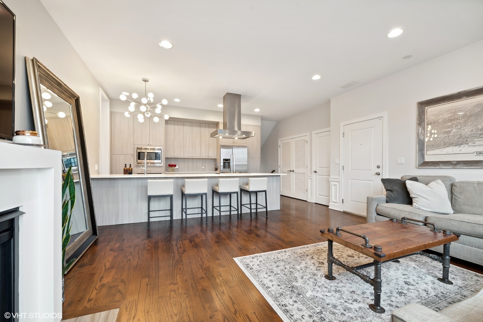 3003 North California Avenue, Unit 2N Chicago, IL 60618 - Photo 4 of 17 a living room with dining table and a wooden floor