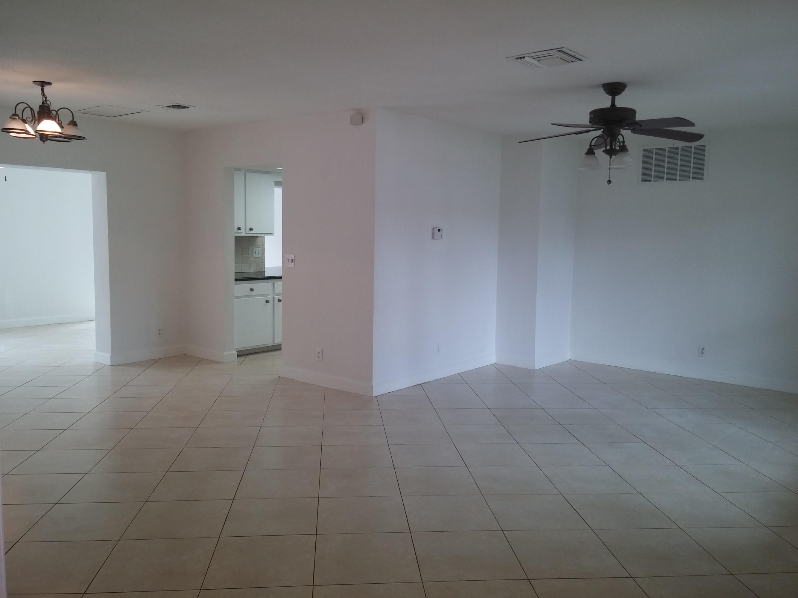 29 Tam O Shanter Lane Boca Raton, FL 33431 - Photo 8 of 18 an empty room with a empty space