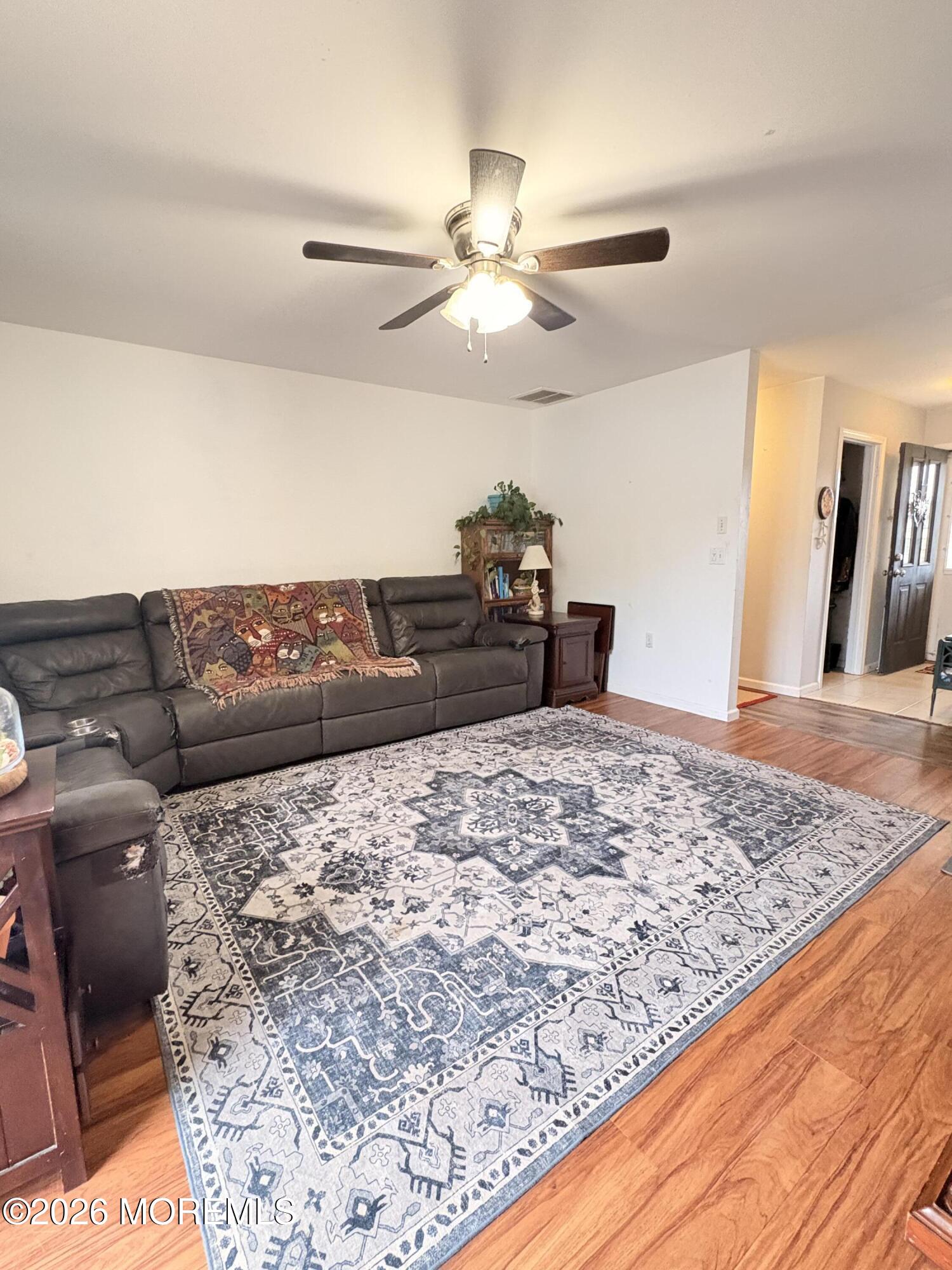 456 Dock Road Forked River, NJ 08731 - Photo 6 of 14 a living room with a couch