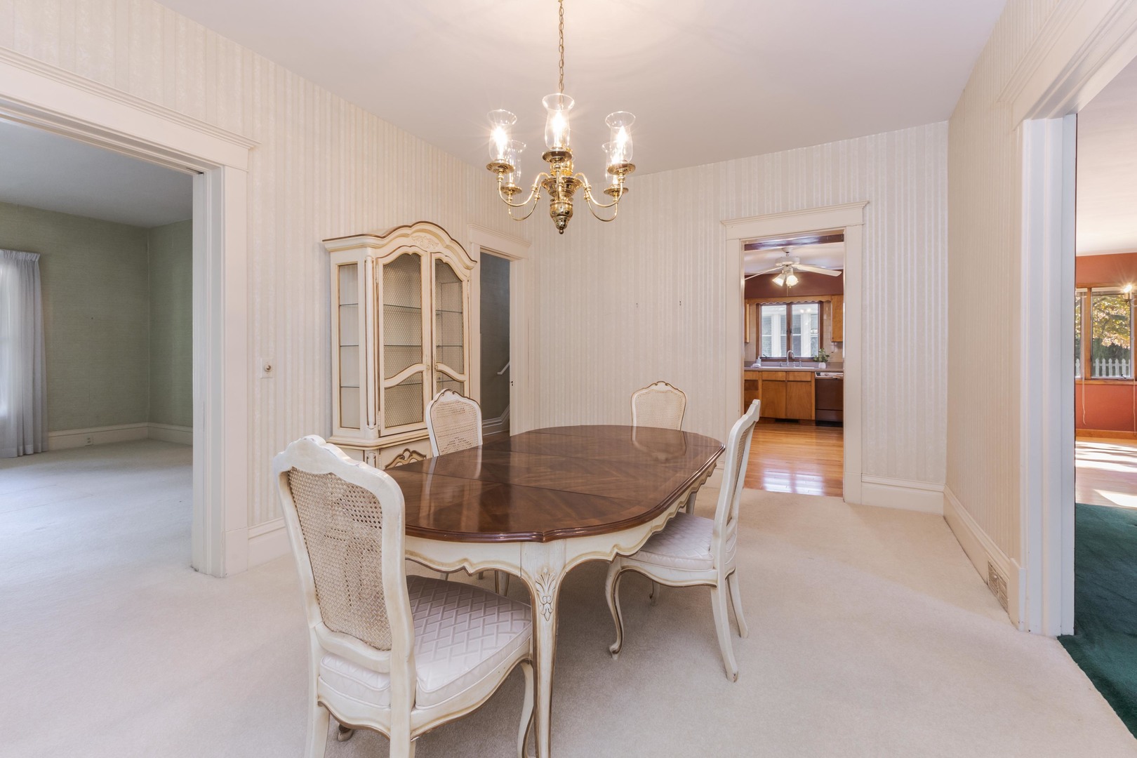 1513 East Grove Street Bloomington, IL 61701 - Photo 13 of 48 a dining room with furniture and chandelier