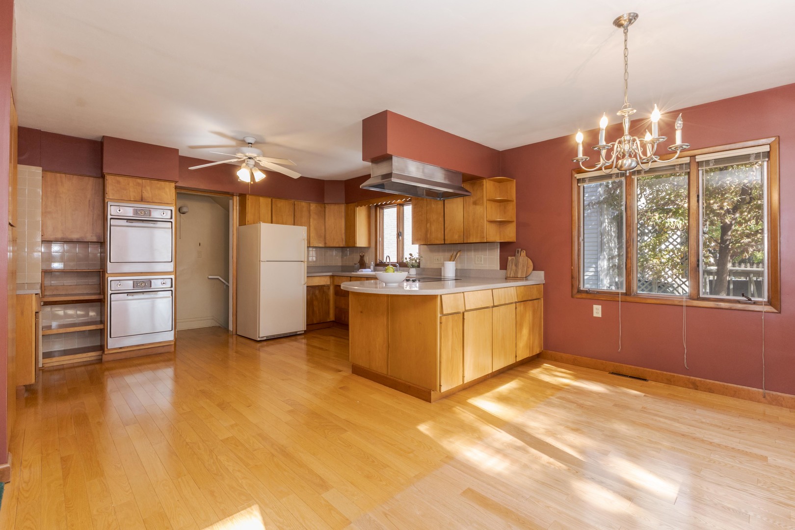 1513 East Grove Street Bloomington, IL 61701 - Photo 15 of 48 a kitchen with refrigerator and cabinets