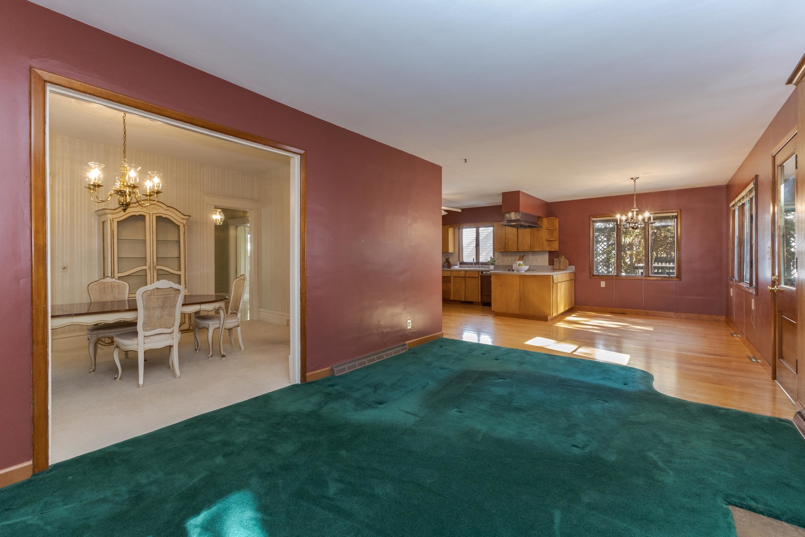 1513 East Grove Street Bloomington, IL 61701 - Photo 22 of 48 a view of a livingroom with furniture and a kitchen