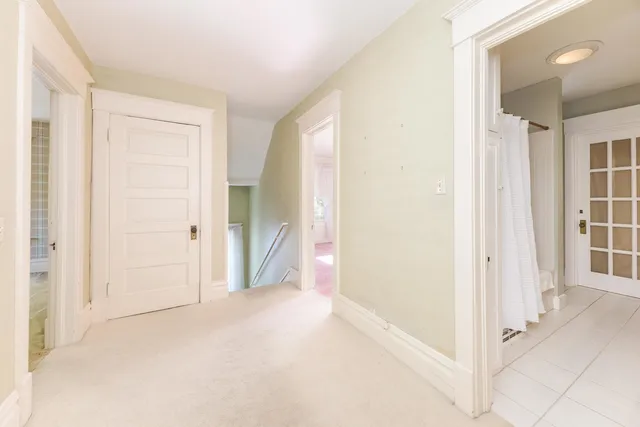 a bathroom with a double vanity sink a and a mirror