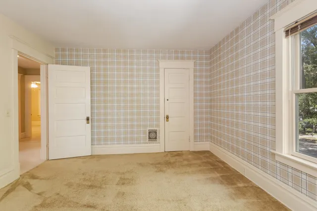 a view of a house with a street