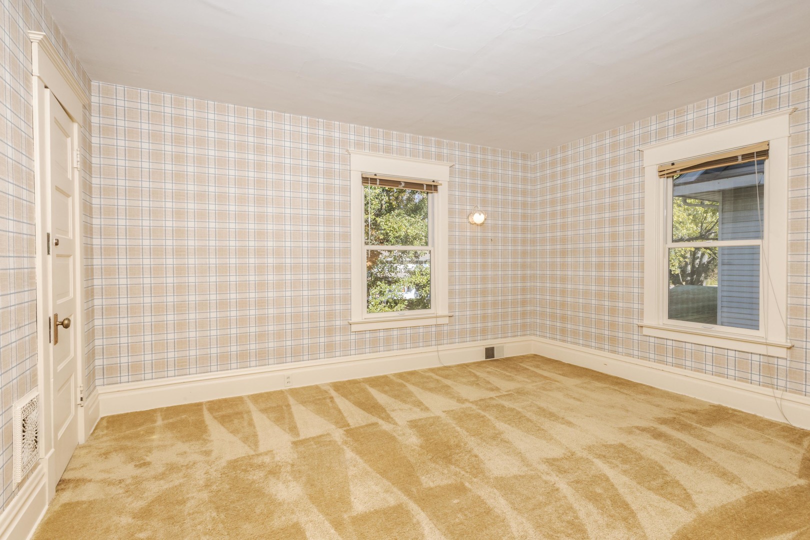 1513 East Grove Street Bloomington, IL 61701 - Photo 34 of 48 a view of an empty room with a window