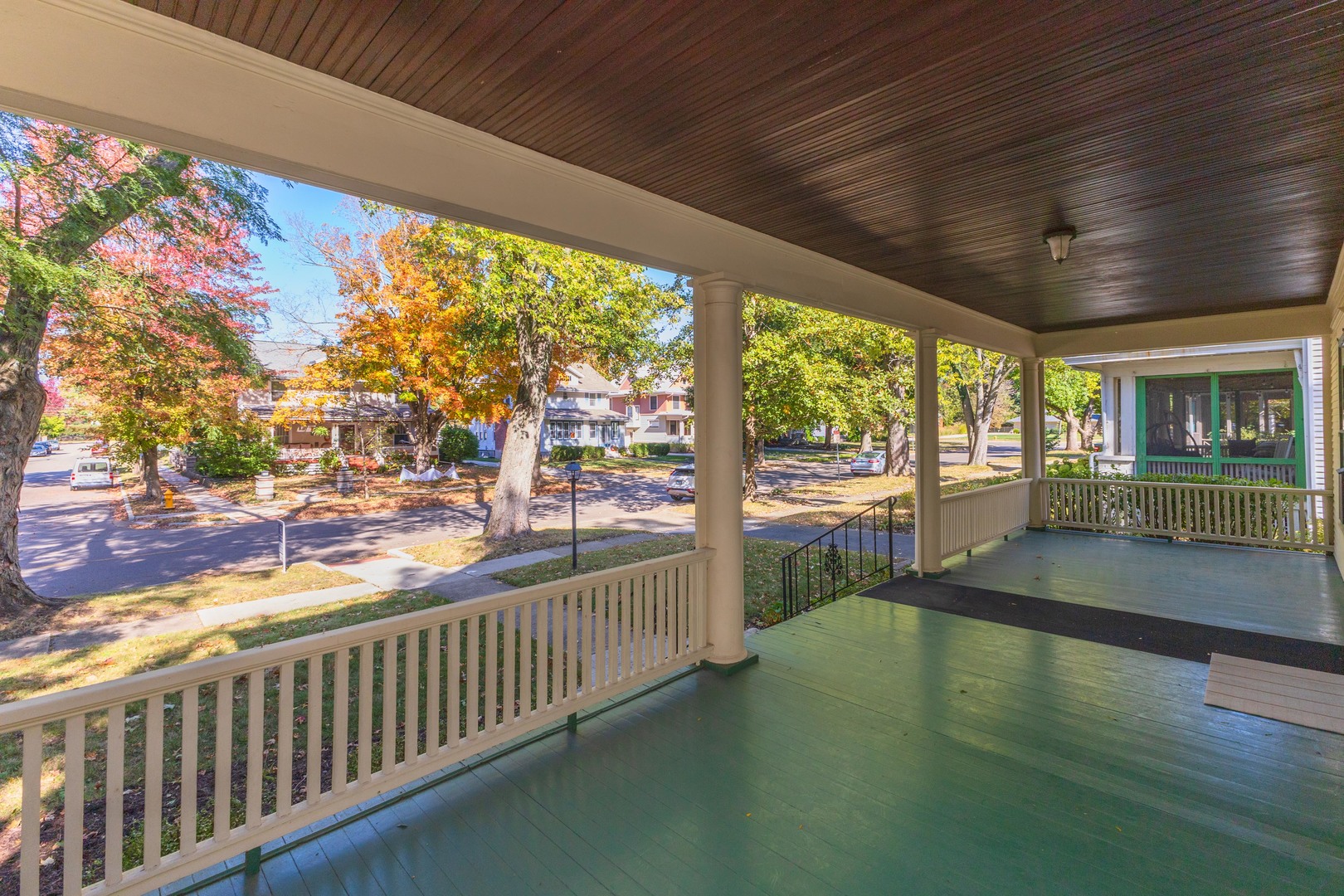 1513 East Grove Street Bloomington, IL 61701 - Photo 4 of 48 a view of a porch and wooden floor