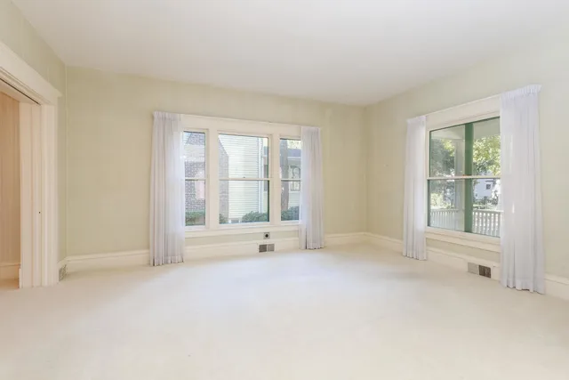 an empty room with windows