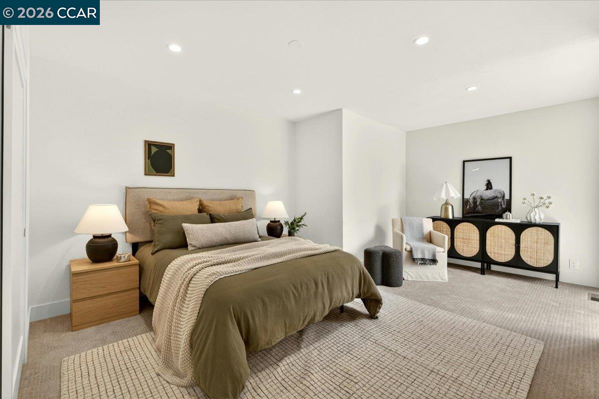24 Las Vegas Road Orinda, CA 94563 - Photo 27 of 47 a bedroom with a bed and night stand
