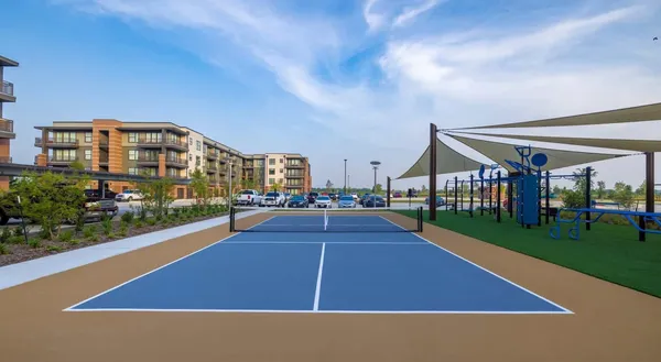 a view of an chairs and table on the patio