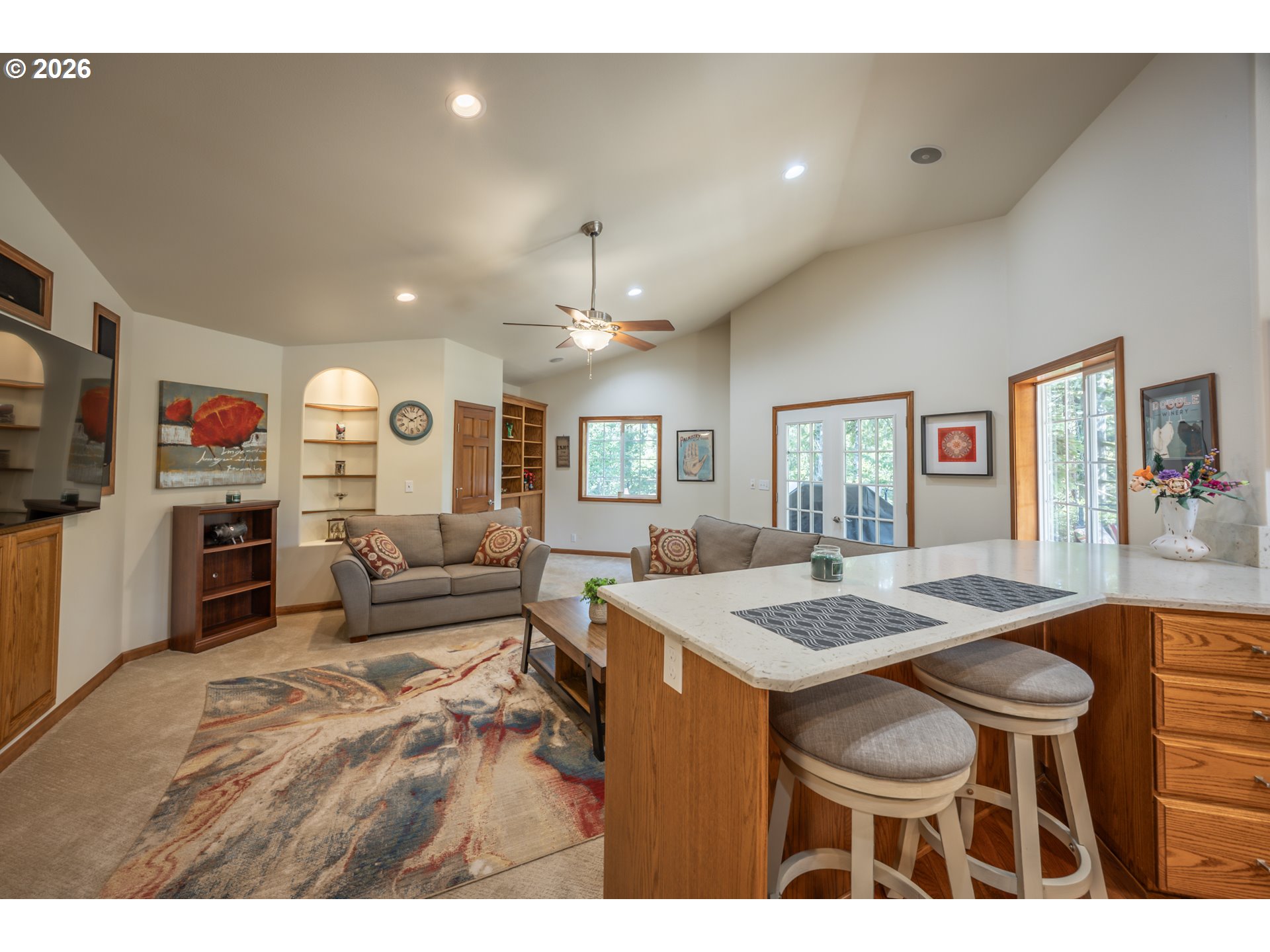 2193 13th Street Florence, OR 97439 - Photo 22 of 48 a living room with furniture and kitchen view