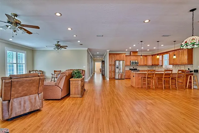 a bathroom with a sink double vanity granite and a shower