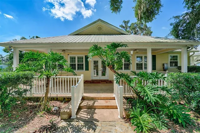 a front view of a house with a porch