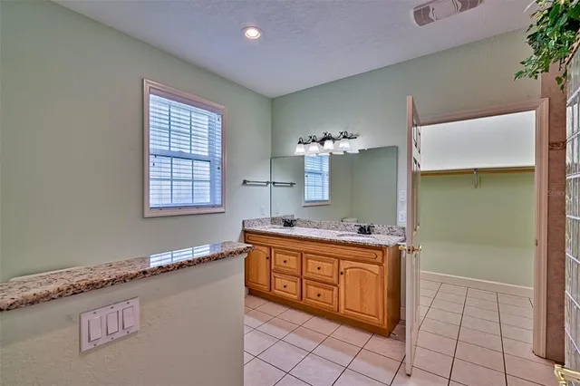 a view of room with window and wooden floor