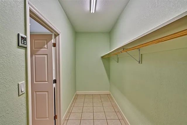a view of a porch with wooden floor and outdoor space