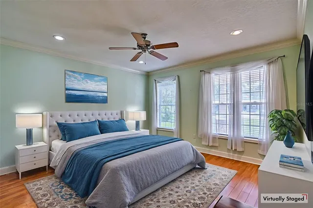 a view of a porch with a floor to ceiling window with wooden fence
