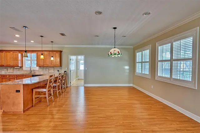 a view of green field with trees
