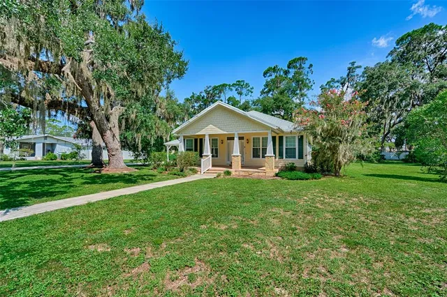 a view of a garden from a balcony