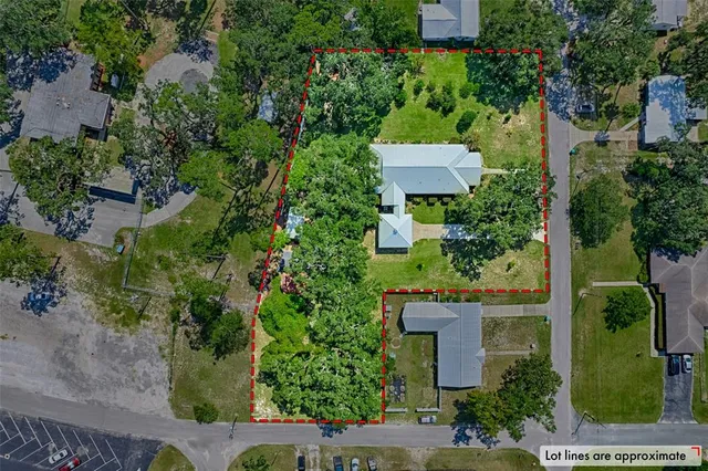 a kitchen with stainless steel appliances granite countertop a refrigerator and microwave
