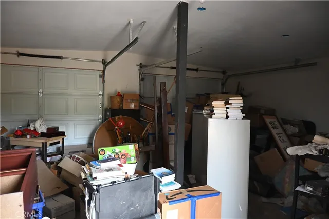 a room with furniture and musical instruments