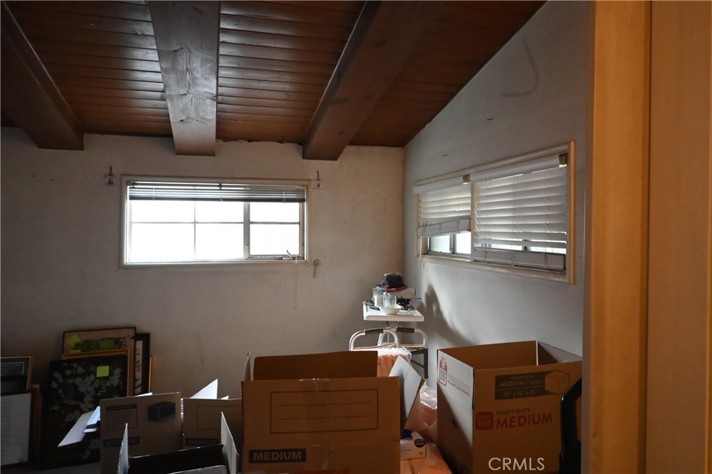 1037 North Valley Street Burbank, CA 91505 - Photo 8 of 27 a room with furniture and musical instruments