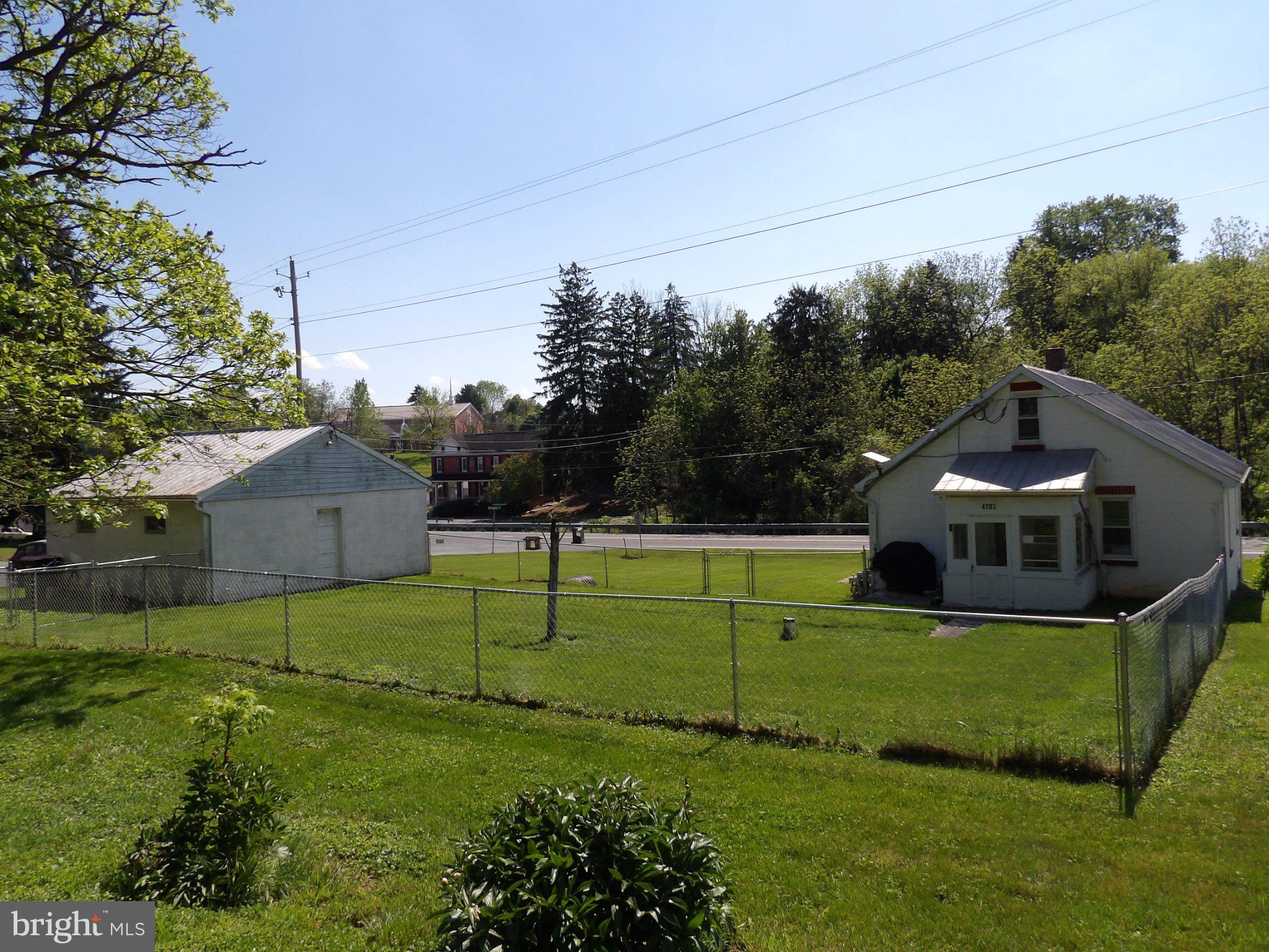 4703 Orphanage Road Waynesboro, PA 17268 - Photo 6 of 18 Charming homes with lush green lawns.