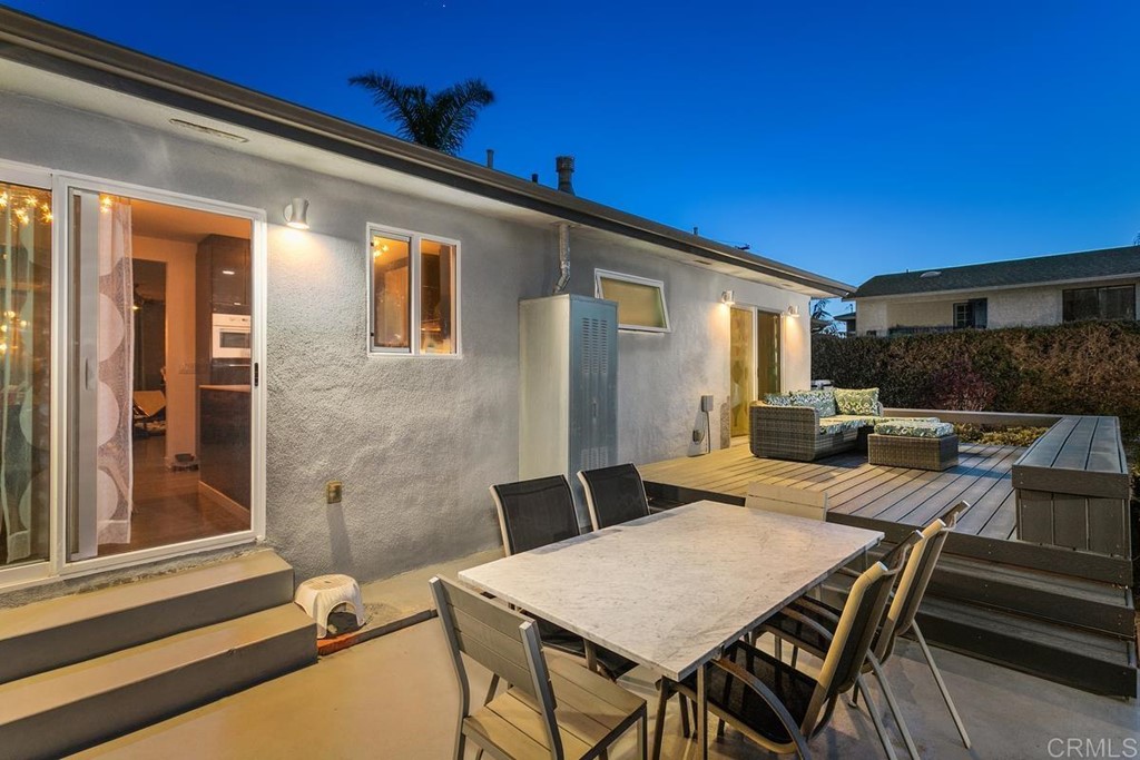 990 Laguna Drive Carlsbad, CA 92008 - Photo 18 of 21 a outdoor space with a couch and chairs