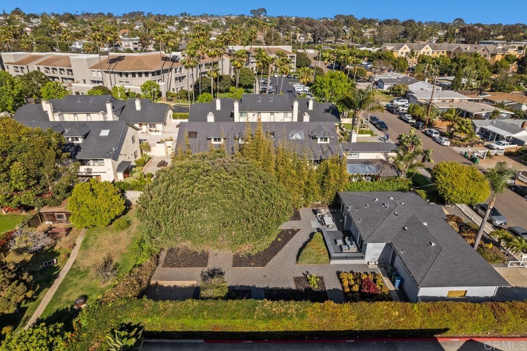990 Laguna Drive Carlsbad, CA 92008 - Photo 20 of 21 an aerial view of residential houses with outdoor space and trees