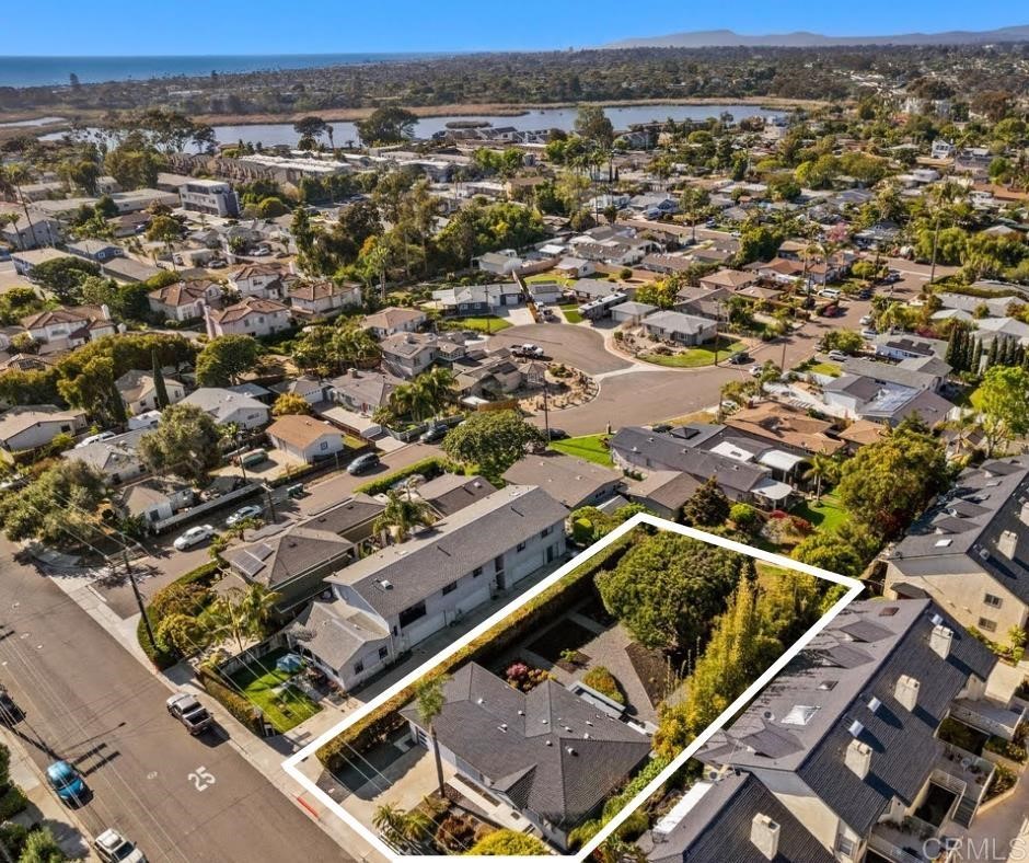 990 Laguna Drive Carlsbad, CA 92008 - Photo 21 of 21 an aerial view of multiple houses with a yard