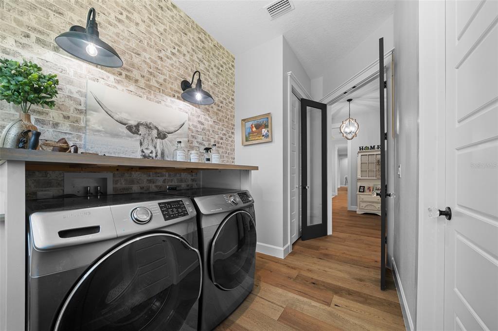 11707 Southeast 101st Court Road Belleview, FL 34420 - Photo 42 of 84 a utility room with dryer and washer