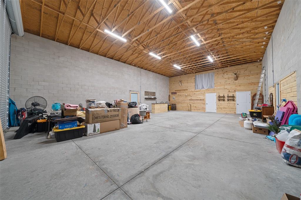 11707 Southeast 101st Court Road Belleview, FL 34420 - Photo 73 of 84 a view of parking garage with cars parked