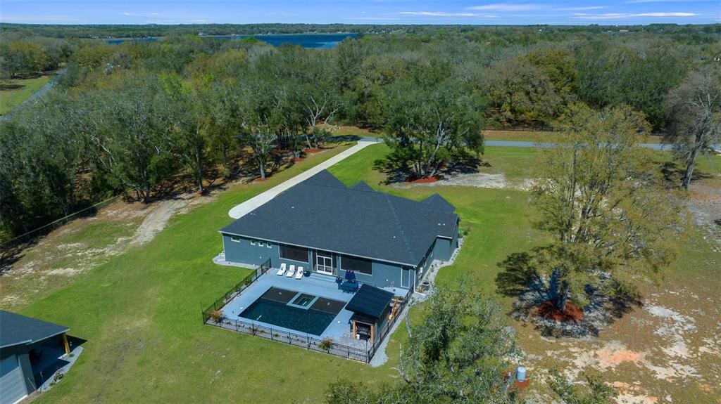 11707 Southeast 101st Court Road Belleview, FL 34420 - Photo 76 of 84 an aerial view of a house
