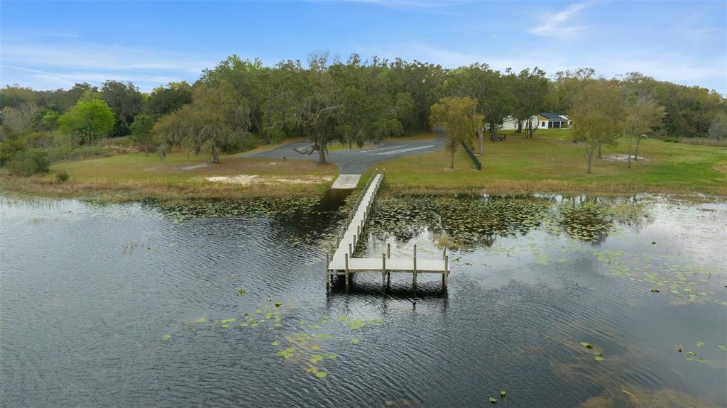 11707 Southeast 101st Court Road Belleview, FL 34420 - Photo 83 of 84 a view of a lake view