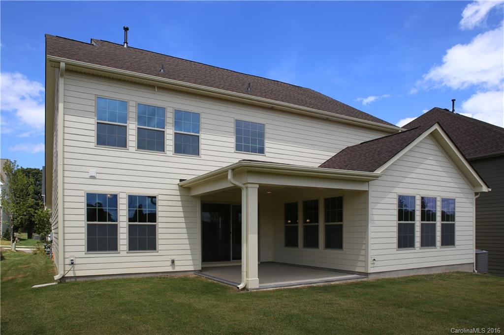 294 Helton Lane, Unit 8 Fort Mill, SC 29708 - Photo 2 of 19 front view of a house with a yard