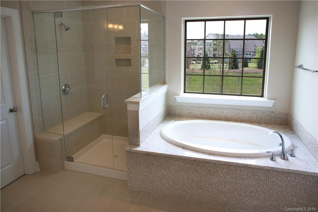 294 Helton Lane, Unit 8 Fort Mill, SC 29708 - Photo 12 of 19 a bathroom with a bathtub and shower
