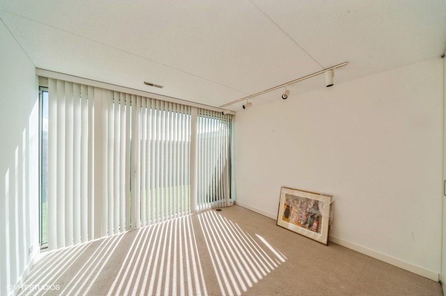 75 Wellington Road Northbrook, IL 60062 - Photo 6 of 11 a view of a room with a large window