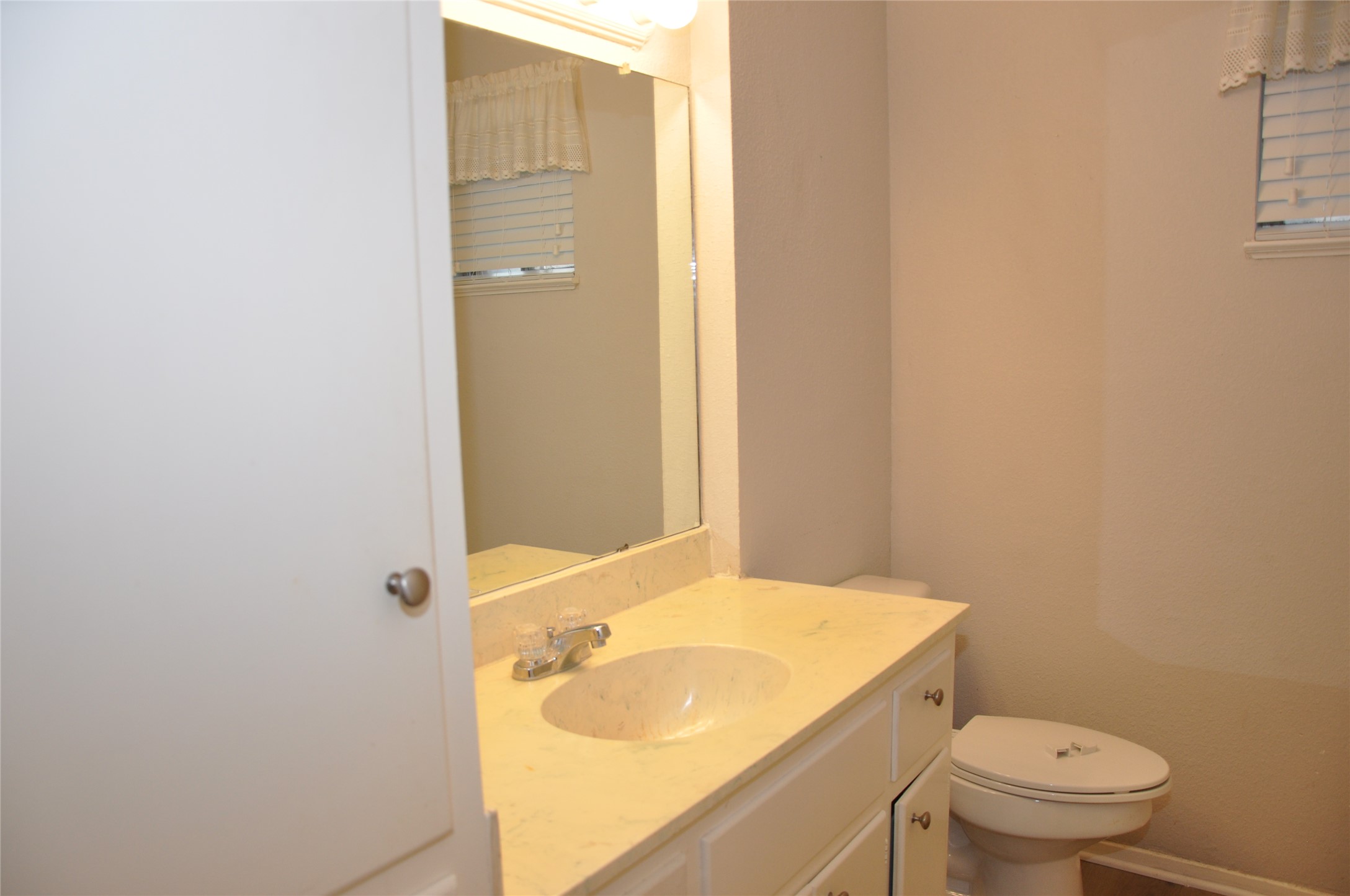 2011 Gathright Cove, Unit A Austin, TX 78704 - Photo 12 of 17 a bathroom with a sink and a toilet