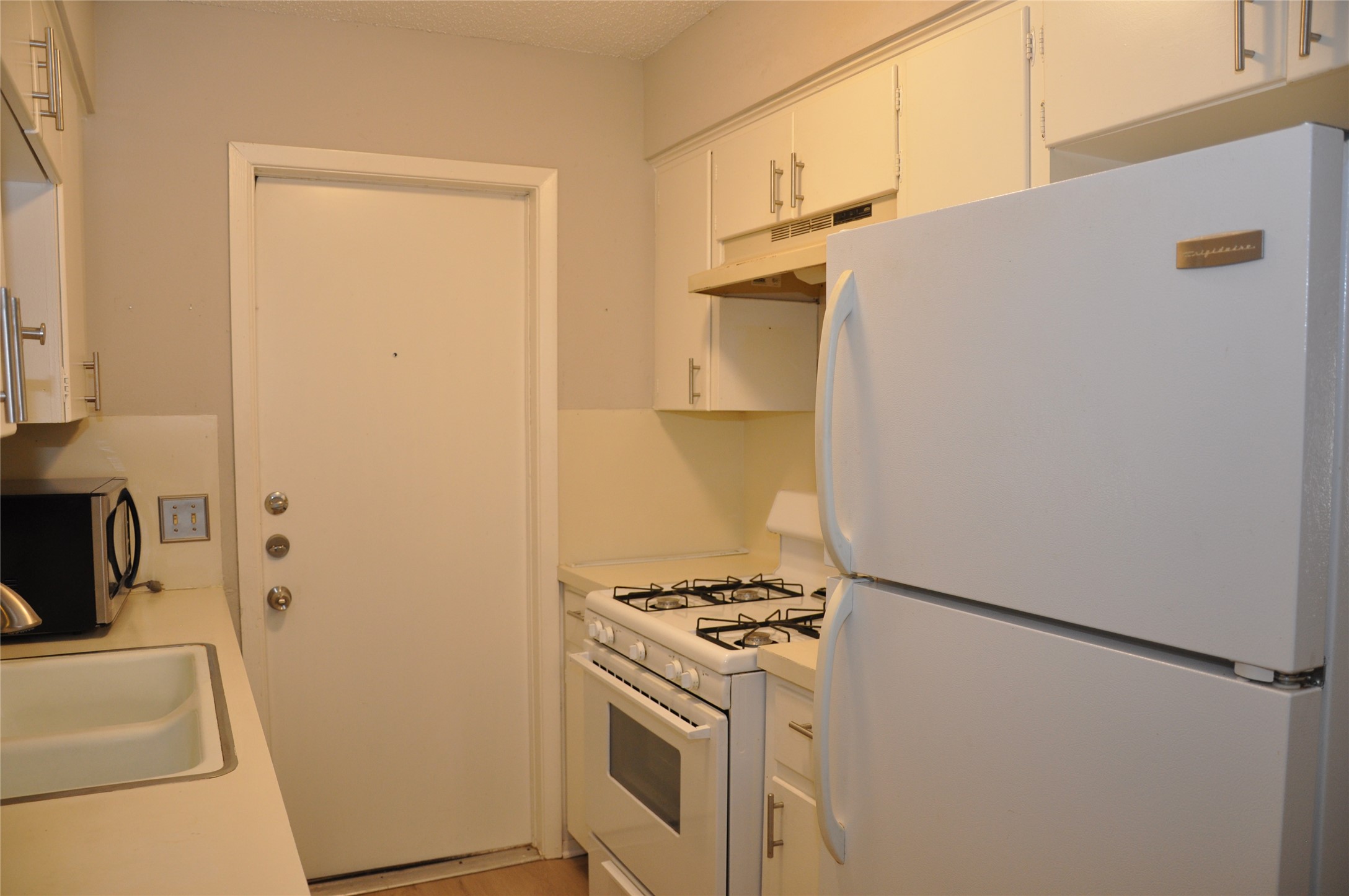 2011 Gathright Cove, Unit A Austin, TX 78704 - Photo 9 of 17 a view of storage and utility room with washer and dryer