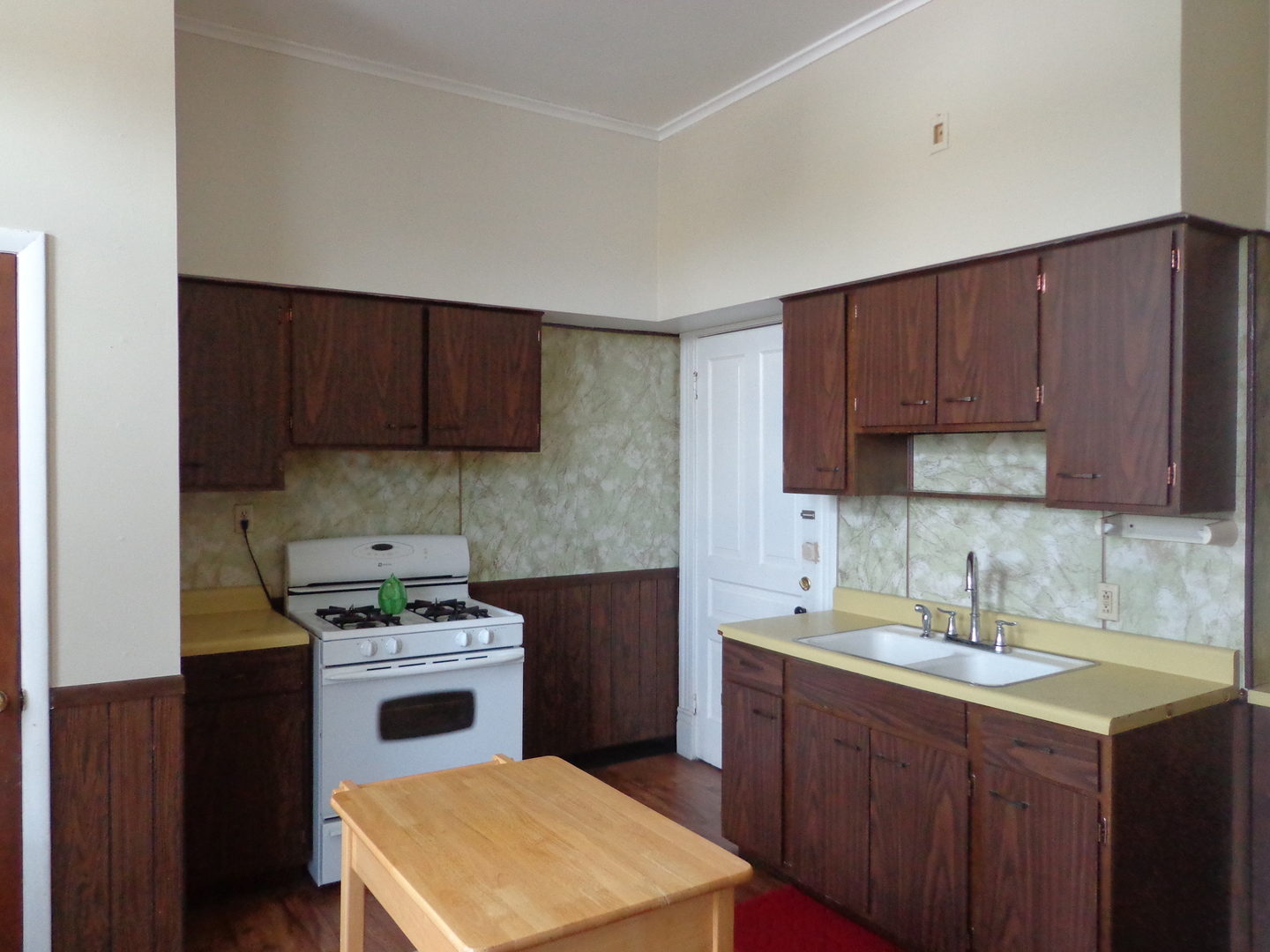 2357 Walnut Street, Unit 3 Blue Island, IL 60406 - Photo 12 of 16 a kitchen with a sink stove and cabinets