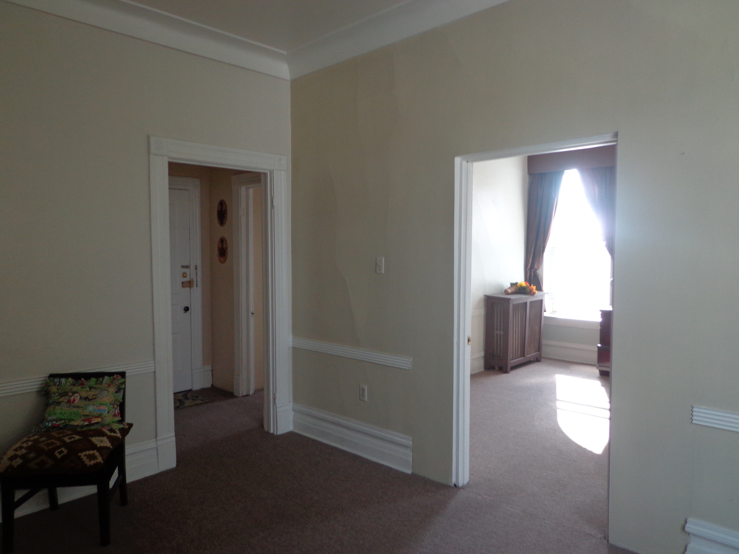 2357 Walnut Street, Unit 3 Blue Island, IL 60406 - Photo 6 of 16 a view of a hallway with a livingroom and a window