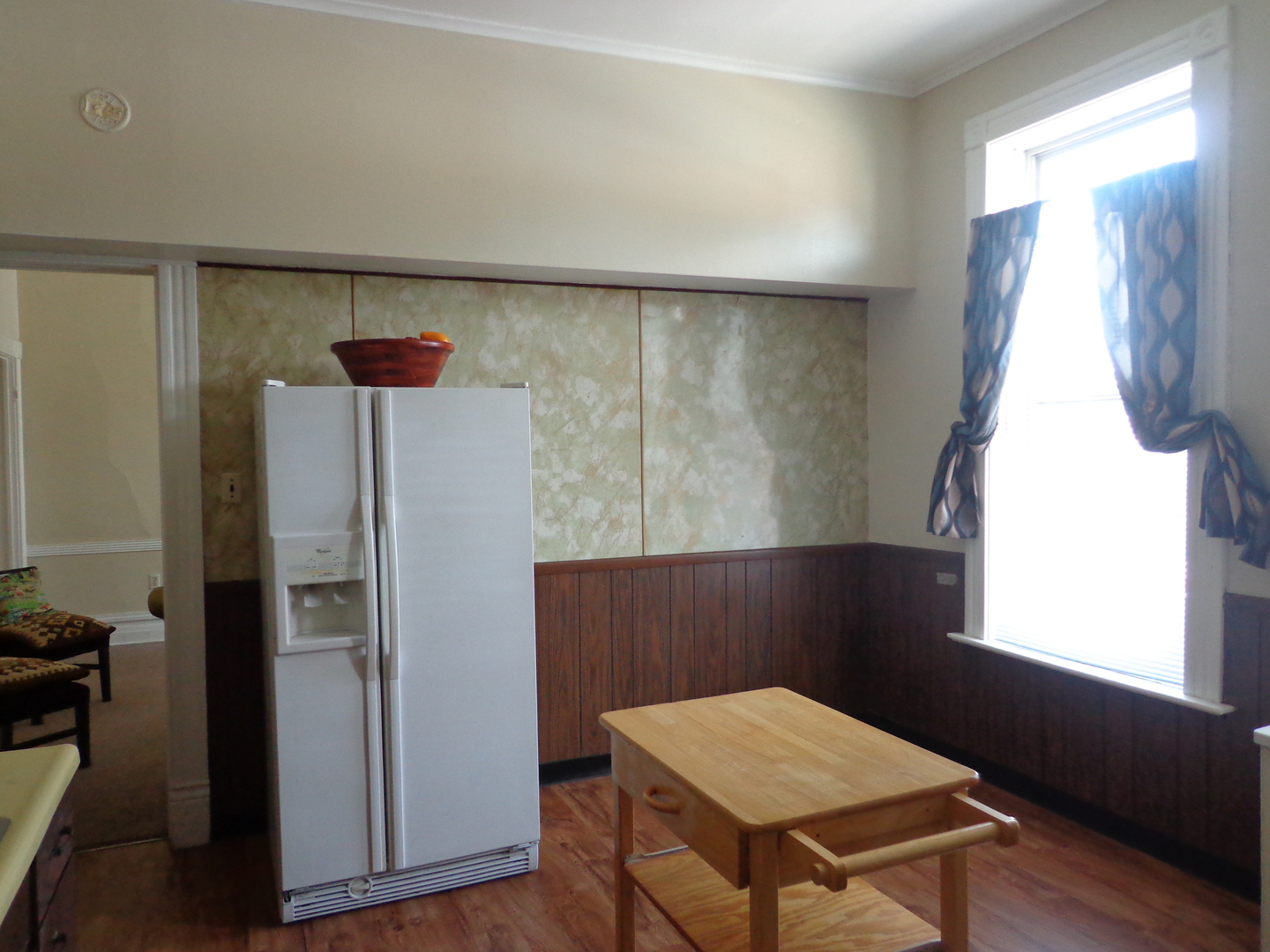 2357 Walnut Street, Unit 3 Blue Island, IL 60406 - Photo 10 of 16 a kitchen with a table and refrigerator
