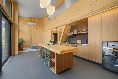 a kitchen with a stove and a refrigerator