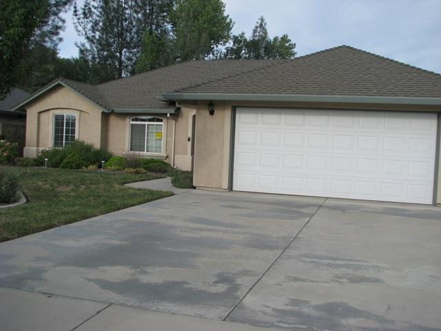 7550 Pit Road Redding, CA 96001 - Photo 1 of 20 a front view of a house with a yard